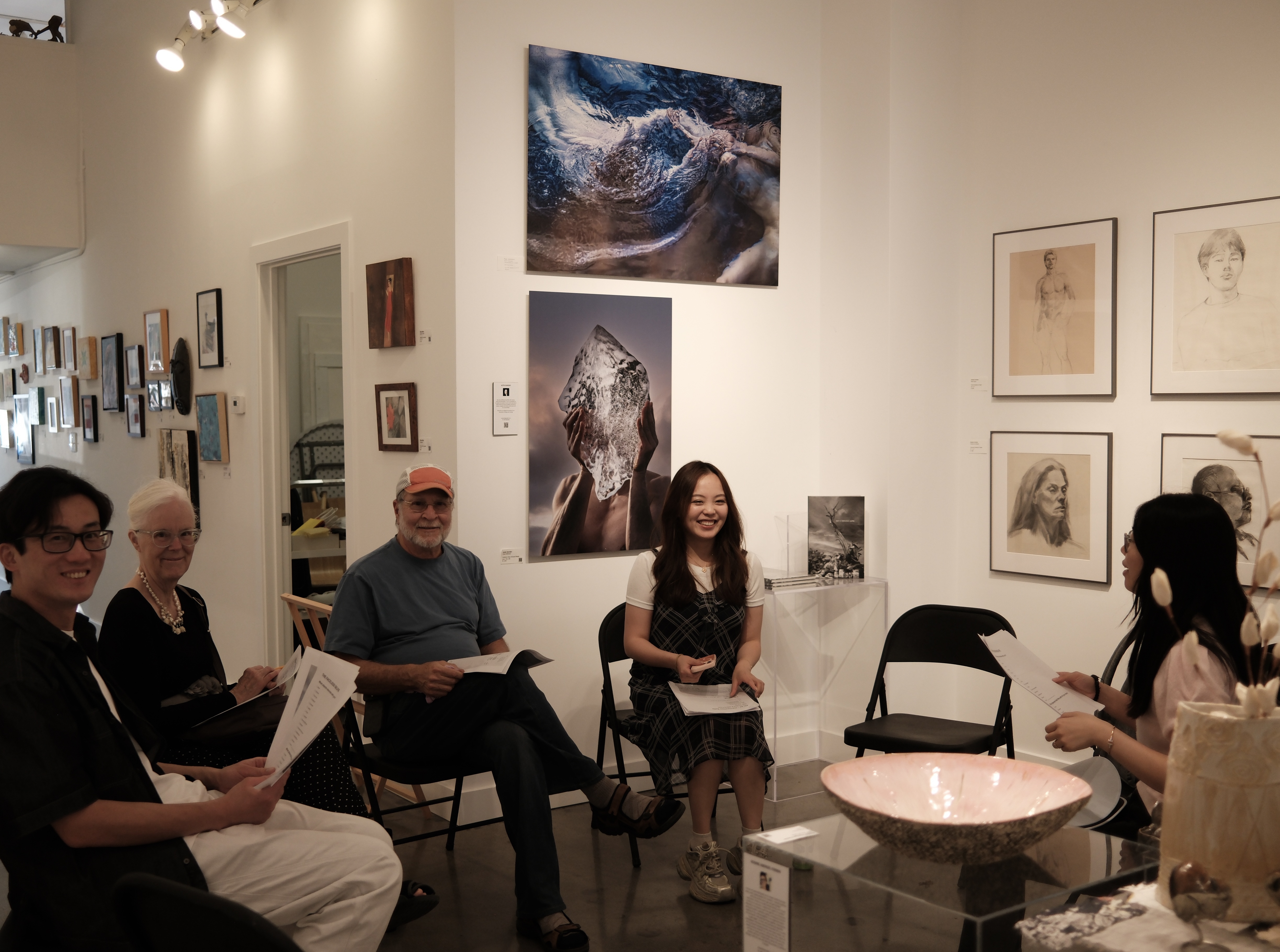 Participants seated in a circle during the fourth AIC gathering at Gallery House.